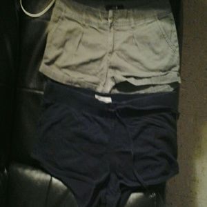 Army green short shorts and black old navy shorts