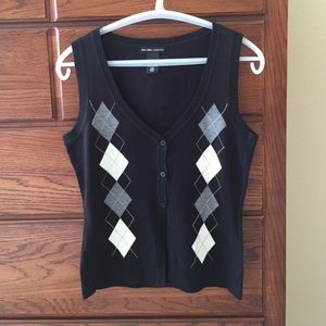 Black, white, and gray argyle button down vest