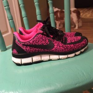 Pink leopard Nike tennis shoes