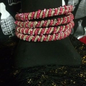 Pink and silver four layered springs  bracelet.