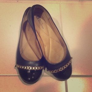 Black flags with gold detail