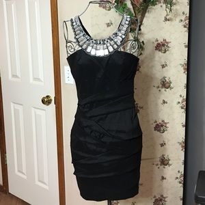 Black cocktail with jeweled neckline