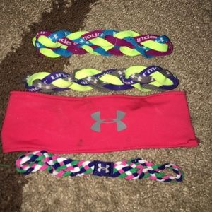A bundle of 13 under armour headbands
