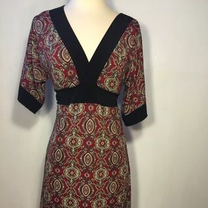 A-line dress with paisley print in polyester.