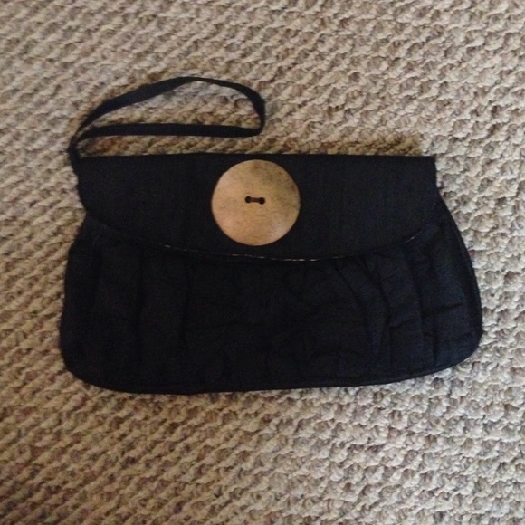 Black vintage wristlets with big button accent