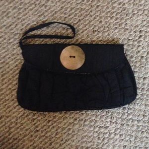 Black vintage wristlets with big button accent
