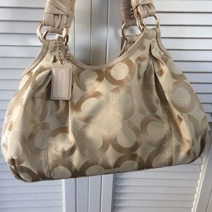 Signature print Coach purse.