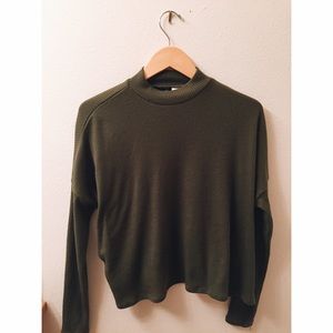 ribbed green turtleneck top