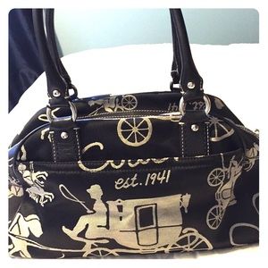 Black and gray Coach purse