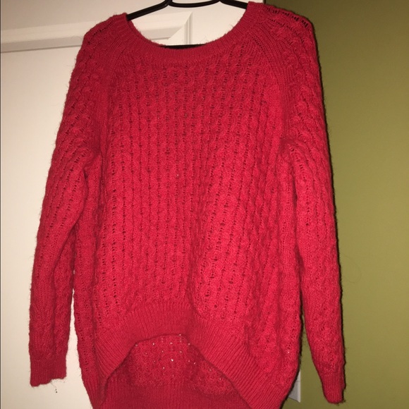 H&M hi-low sweater in orange.