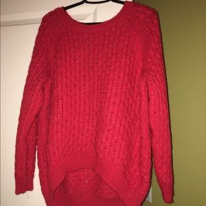H&M hi-low sweater in orange.