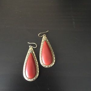 Burgundy and gold tear drop earring.