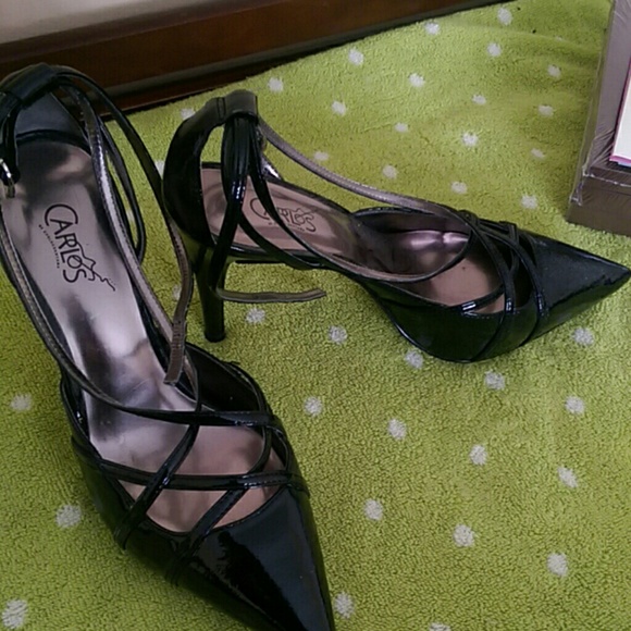 Carlos santanta patent leather heels.