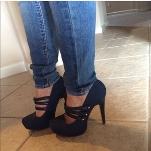 Andrea Jean Navy blue pump heels.