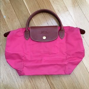 Small pink Le Pliage Longchamp handbag