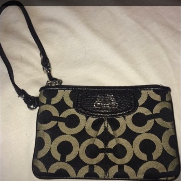Black coach wristlet.