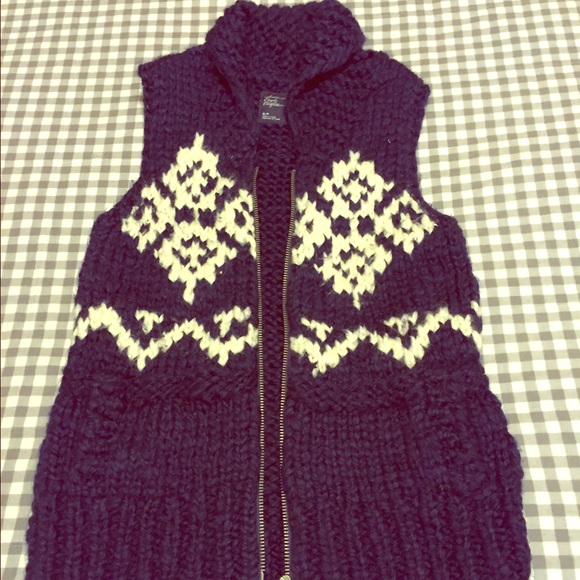 Blue and white vest.