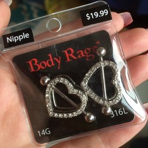New never worn nipple rings