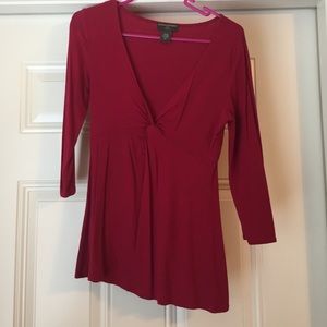 Pink cotton deep v neck shirt.