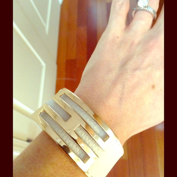 White faux leather and designer buckle bracelet