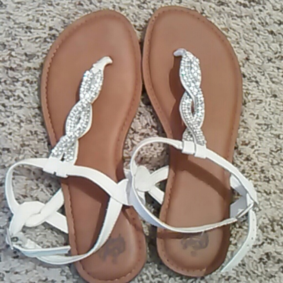 Light brown sandals with white strap