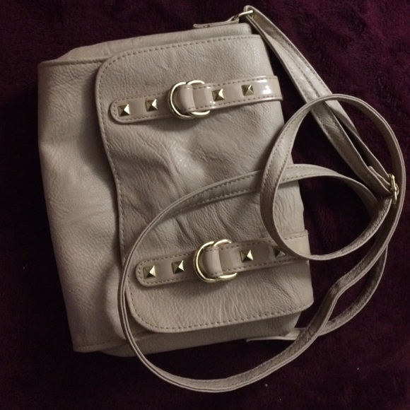 Beige colored crossbody bag
