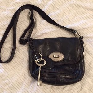 Small fossil turn lock crossbody purse