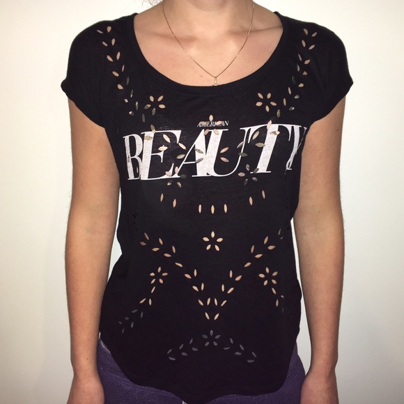 black shirt with flower cut outs - Picture 1 of 3