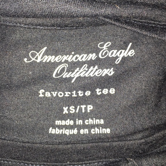 black shirt with flower cut outs - Picture 3 of 3