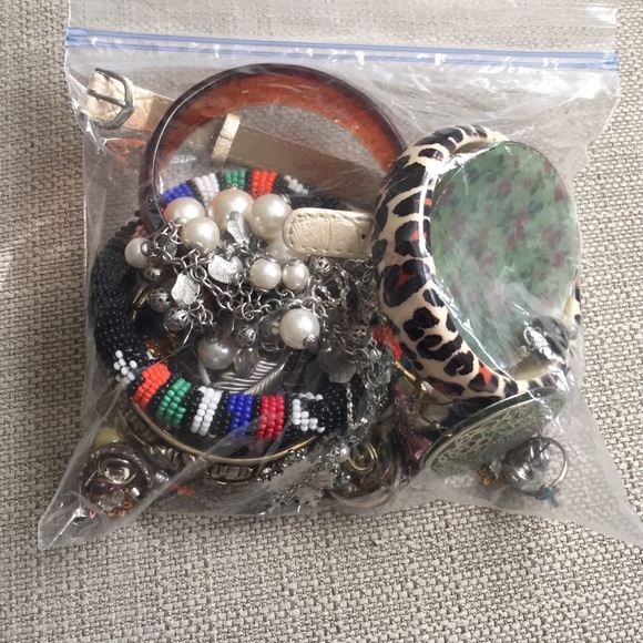 Bag of earrings, necklaces and bracelets