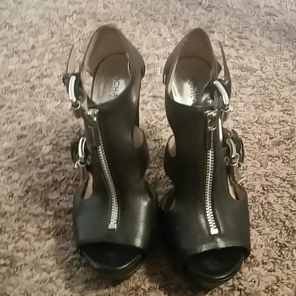 Michael by Michael Kors black platform heels.