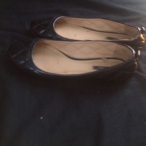 Black quilted slip on shoes