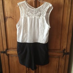 Cute black and white romper size 7