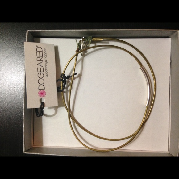 Dogeared corded bracelet/necklace.