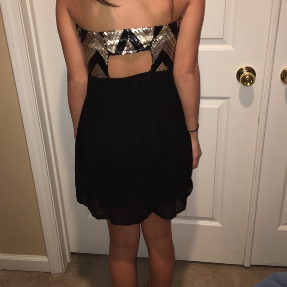 Super cute black and gold dress