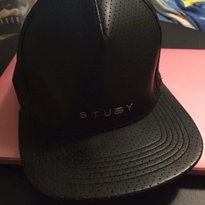 stussy pleather perforated strap back