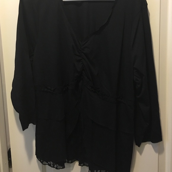 Black top with lace insert.