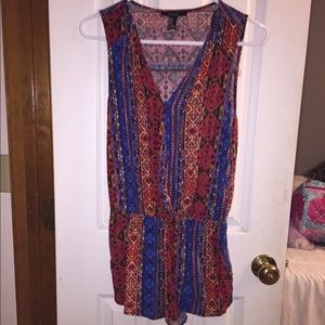 Very pretty romper.