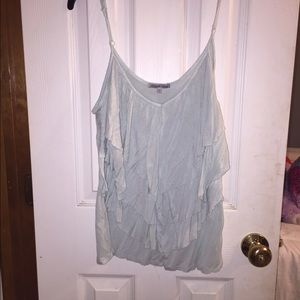 Light blue tank top.