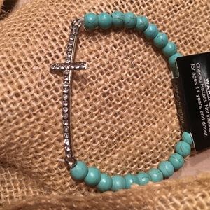 Beautiful turquoise beaded bracelet with cross.
