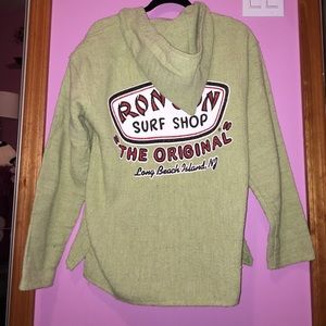 Green Ron Jon pull over. Size medium.