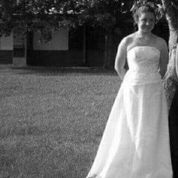 White dress with gold beading on corset