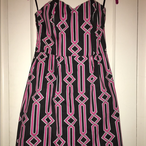 Strapless and striking black and pink dress