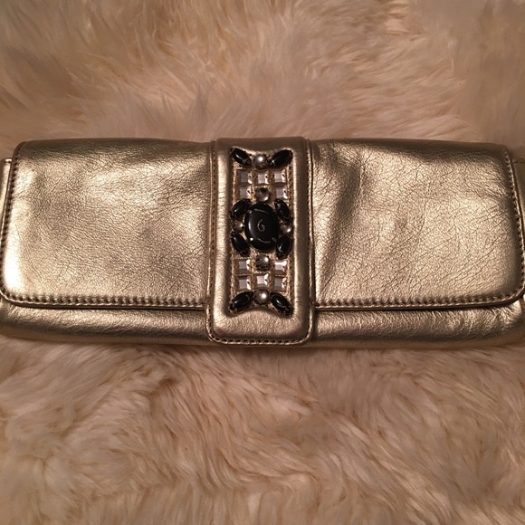 Ann Taylor gold gemstone detail fold over clutch