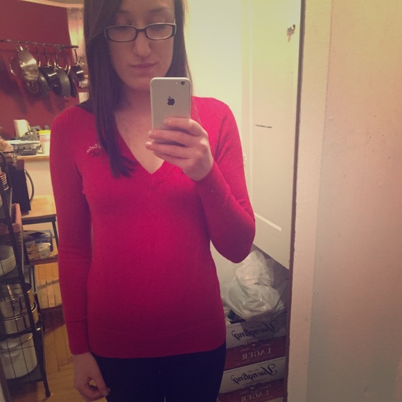 Long sleeved red v-neck sweater, size small