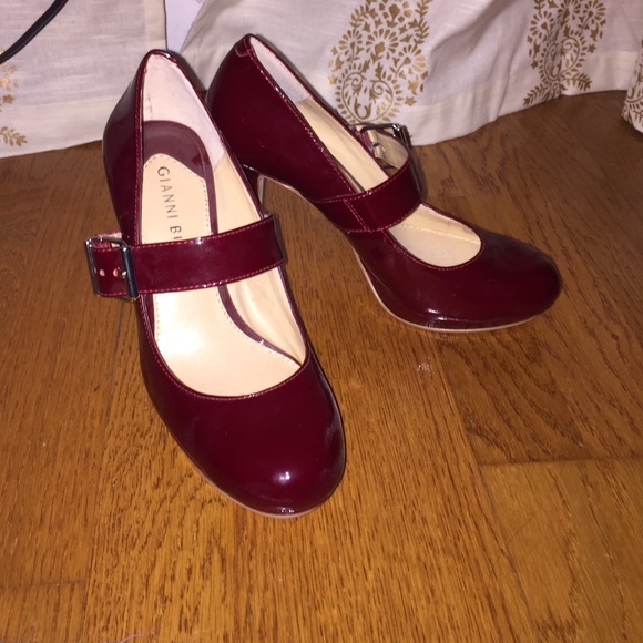 burgundy/red high heels.