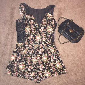 Flower Romper sheer in the front.