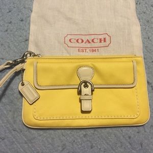 Authentic Coach yellow wristlet with dust bag!
