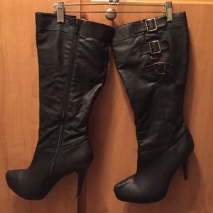 Sexy black heeled boots with side buckles