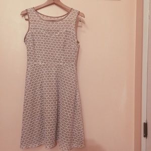 Floral, beige and white lace dress.